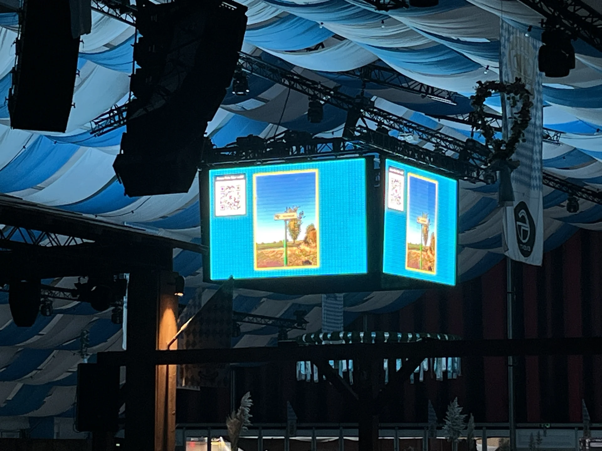 QR Slides met bezoekersfoto’s op grote schermen tijdens een event